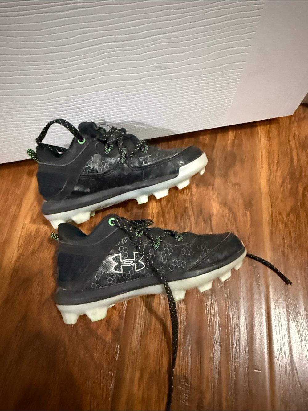 Under Armour Kids Black and Green Athletic Cleats
